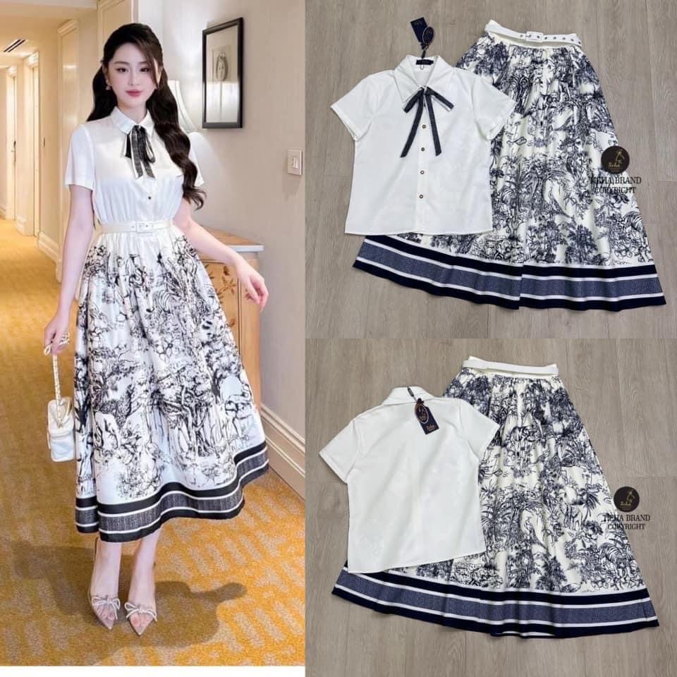 Set 2 ชิ้น เสื้อเชิ๊ตคอปกแขนสั้น สีขาวเนื้อผ้าดีทรงoversize มีกระดุมหน้าเรียง ยาว ช่วงคอเย็บติดริบบิ้นผูกโบว์เก๋ๆ มาพร้อมกับ กระโปรงยาวเอวสูง : สินค้าคุณภาพ (พร้อมส่ง)
