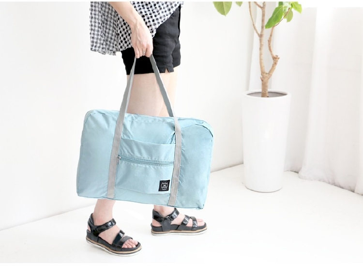 Wind Blows กระเป๋าเดินทางพับเก็บได้ เสียบที่จับกระเป๋าเดินทางได้ มีซิปรูดตอนพับเก็บ สำหรับการเดินทาง ท่องเที่ยว