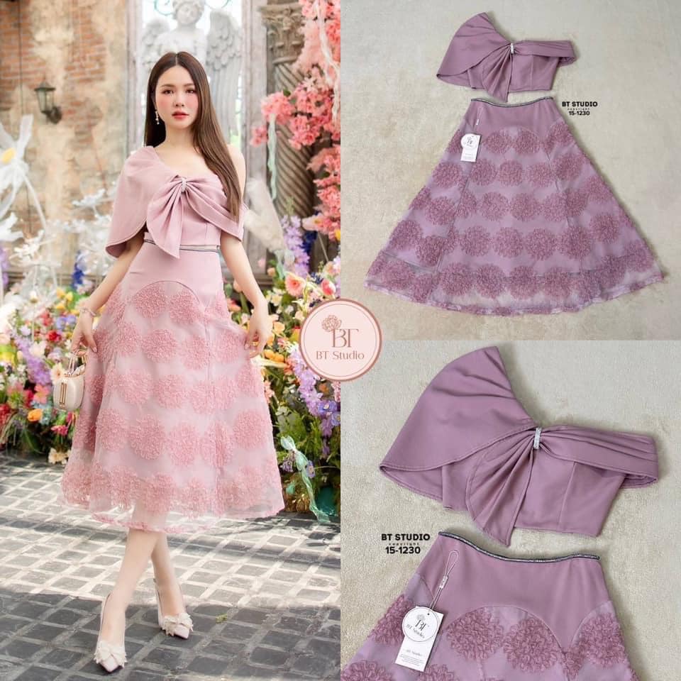 เซท 2 ชิ้น เสื้อเกาะอกดีเทลแต่งปิด ต้นแขนข้างนึงแต่งชายระบายรอดเพชรซิปหลัง มาพร้อมกระโปรงเอวสูงแต่งขอบเพชรเงิน : สินค้าคุณภาพ (พร้อมส่ง)