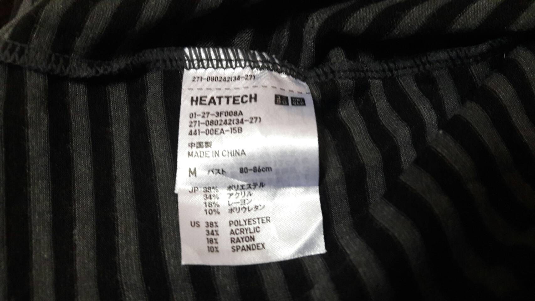 เสื้อฮีทเทคหญิง ลายทางเทาดำ Uniqlo ไซด์ M