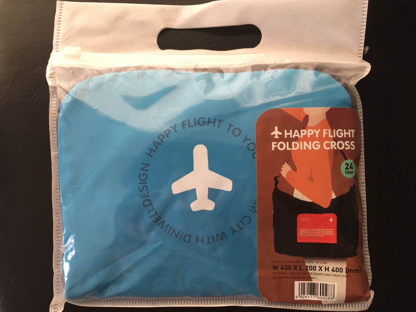 DINIWELL กระเป๋าเดินทางพับเก็บได้ สะพายพาดลำตัวได้ ปรับสายสะพายได้ เสียบที่จับของกระเป๋าเดินทางได้ ผลิตจากโพลีเอสเตอร์กันน้ำ มีซิปรูดตอนพับเก็บ