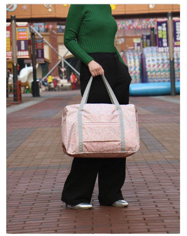 DINIWELL กระเป๋าเดินทางพับเก็บได้ อเนกประสงค์ เพื่อการเดินทาง ท่องเที่ยว ปรับสายสะพายได้ เสียบที่จับของกระเป๋าเดินทางได้ น้ำหนักเบา มีซิปรูดตอนพับเก็บ