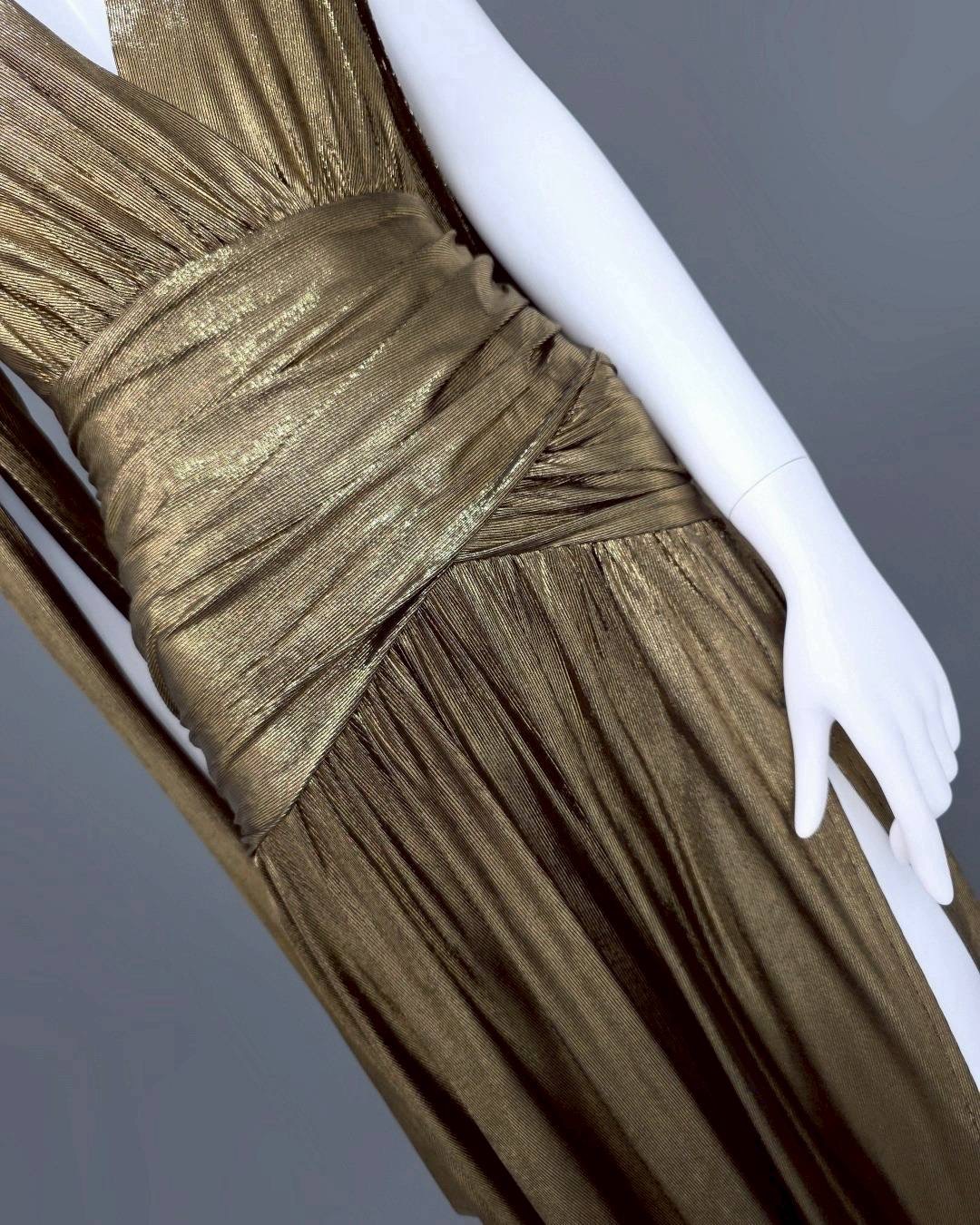 แม็กซี่เดรสเสื้อคอวีป้าย แขนยาวเป็นผ้าคลุมในตัว กระโปรงเข้ารูปตรงสะโพก ผ่าหน้าขา ชายกระโปรงบาน ใส่สบาย : สินค้าคุณภาพ (พร้อมส่ง)