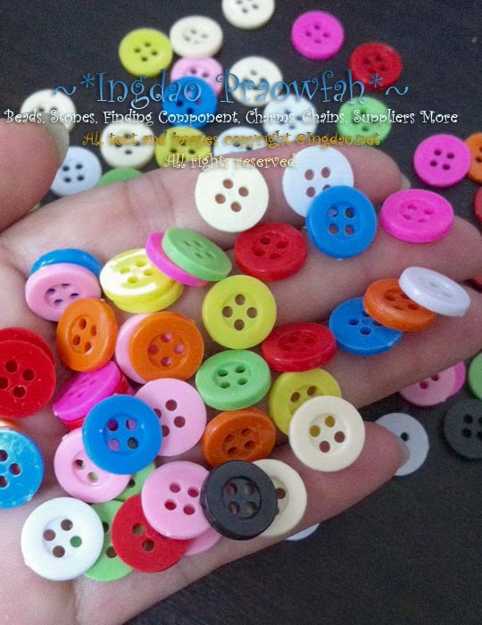 BT-7312mt กระดุมทรงกลม ขอบใหญ่เรียบ คละสี ขนาด 12 มิล. (ราคาต่อแพค 28 บาท/บรรจุ 100 ชิ้น)
