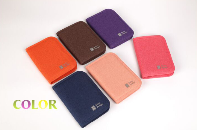 กระเป๋าใส่พาสปอร์ตสั้น กระเป๋าใส่หนังสือเดินทาง ขนาดกะทัดรัด ช่องเยอะ ใส่เอกสารสำคัญ ธนบัตร บัตรต่าง ๆ พกพาสะดวก ผลิตจากโพลีเอสเตอร์กันน้ำ คุณภาพดี