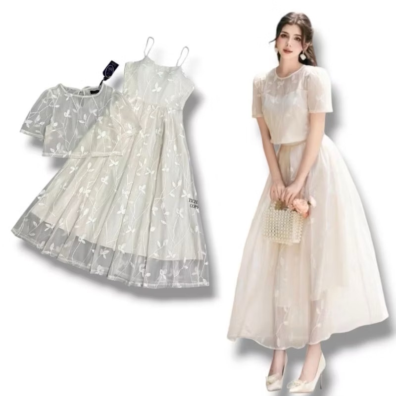 Set 2 ชิ้น สีครีมปักดอกด้ายนูน เดรสยาวสายเดี่ยวช่วงกระโปรงพองพริ้วสวย (อกเสริมฟองน้ำมีซิปหลัง) มาคู่กับเสื้อครอปตัวนอกซีทรูใสแมทส์คู่กันสวยลงตัวมากๆ งานสวย ใส่สบาย : สินค้าคุณภาพ (พร้อมส่ง)