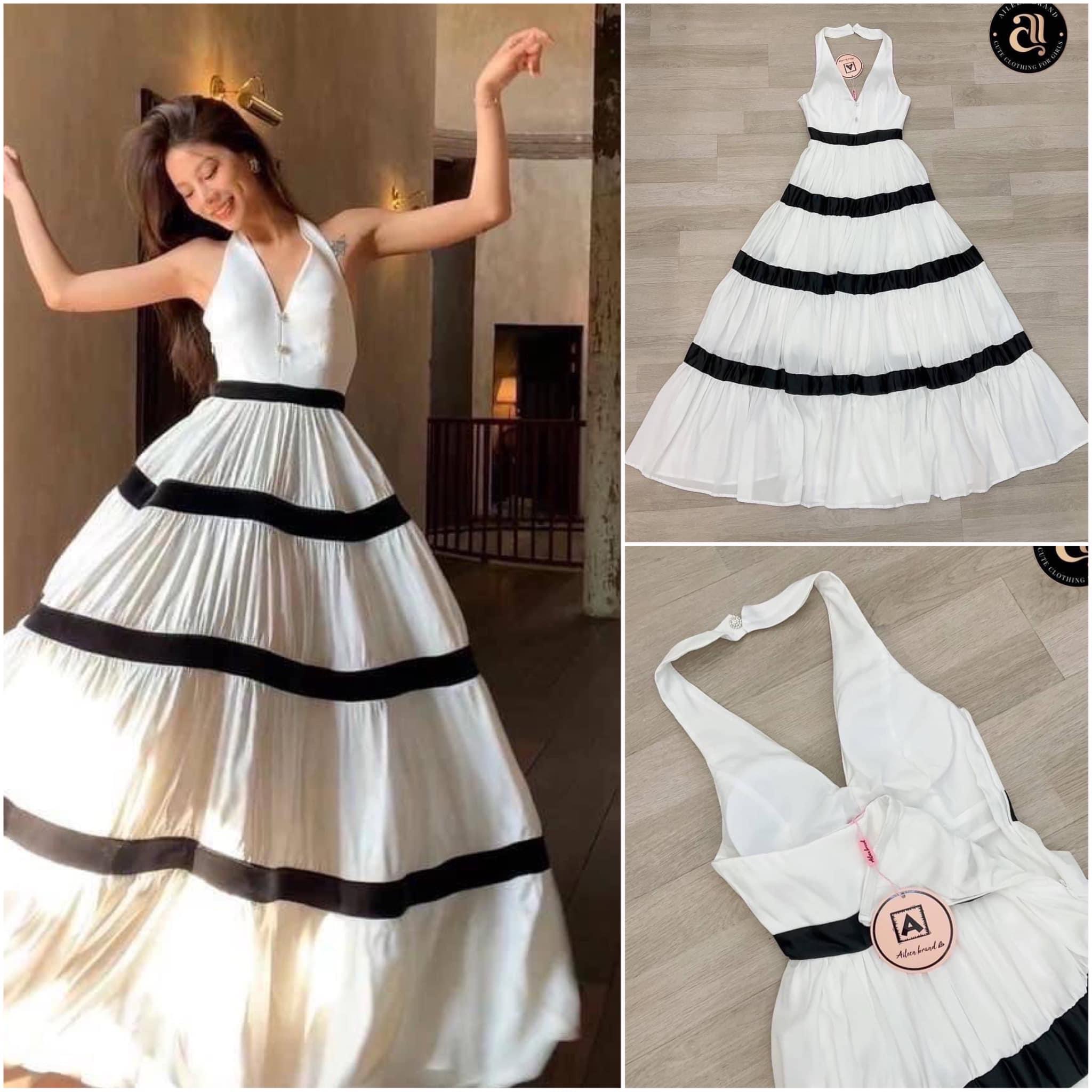 เดรสยาวสีขาว ช่วงอกเนื้อผ้า เรียบมันวาวคอวีแต่งอะไหล่ดอกไม้เพชร ดีไซน์สายคล้องคอมีกระดุมเพชรดอกไม้ ด้านหลังโชว์ครึ่งหลังบน สินค้าคุณภาพ (พร้อมส่ง)