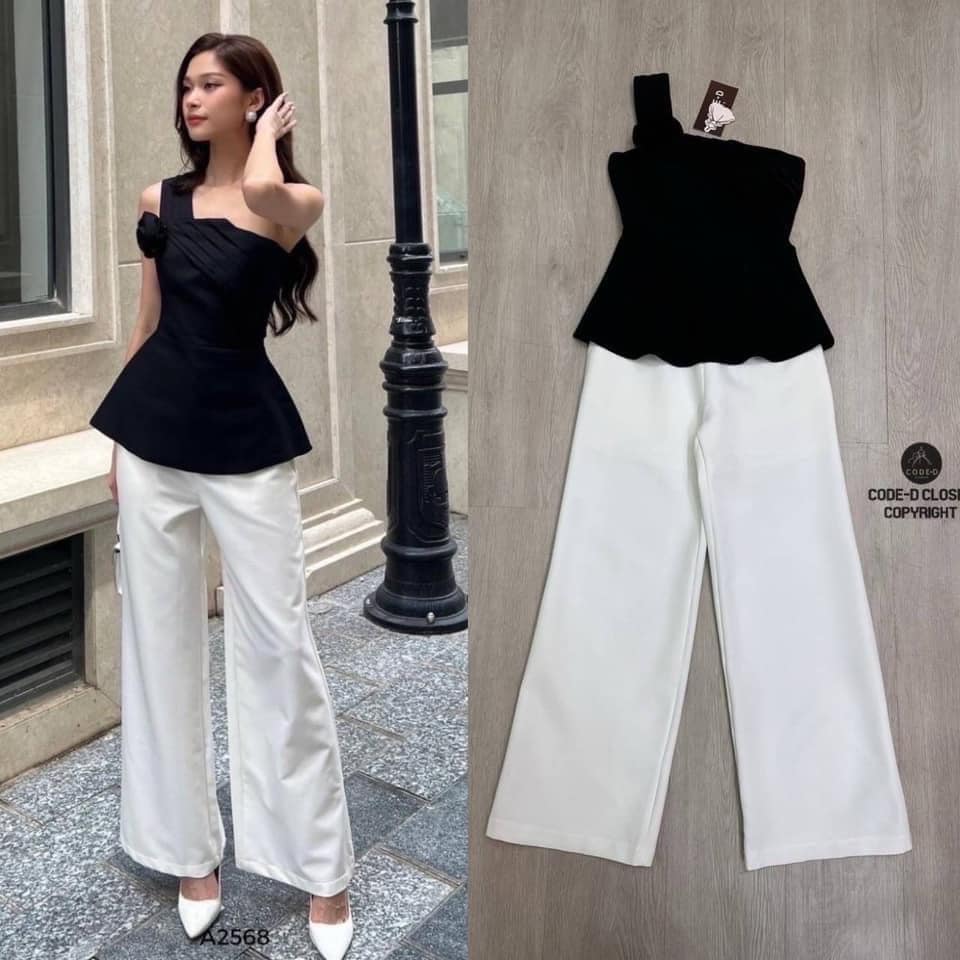 Set 2 ชิ้น เสื้อตัวยาวสีดำ ดีไซน์ไหล่เดียวแต่งผ้าจับจีบยาวมาถึงช่วงอกและแต่งอะไหล่เข็มกลัดดอกกุหลาบทรงเข้ารูปสวย+กางเกงขายาวสีขาวทรงกระบอกใหญ่ ใส่สบาย สินค้าคุณภาพ (พร้อมส่ง)
