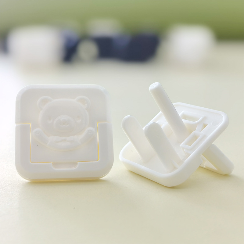 [แพ็ค 10 ชิ้น] ตัวอุดปลั๊กไฟ ที่อุดรูปลั๊กไฟ สำหรับปลั๊กไฟไทย ลายหมี สีขาว/ดำ มีตัวดึง