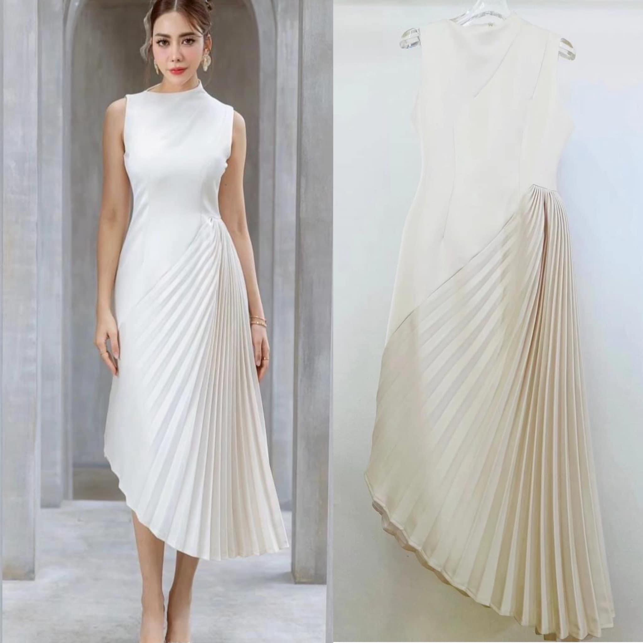 เดรสแขนกุดแต่งพลีทข้าง ช่วงตัวเป็นทรงเข้ารูป สวย กระโปรงด้านข้างแต่งด้วยผ้าอัดพลีทเฉียง ใส่สบาย สินค้าคุณภาพ (พร้อมส่ง)