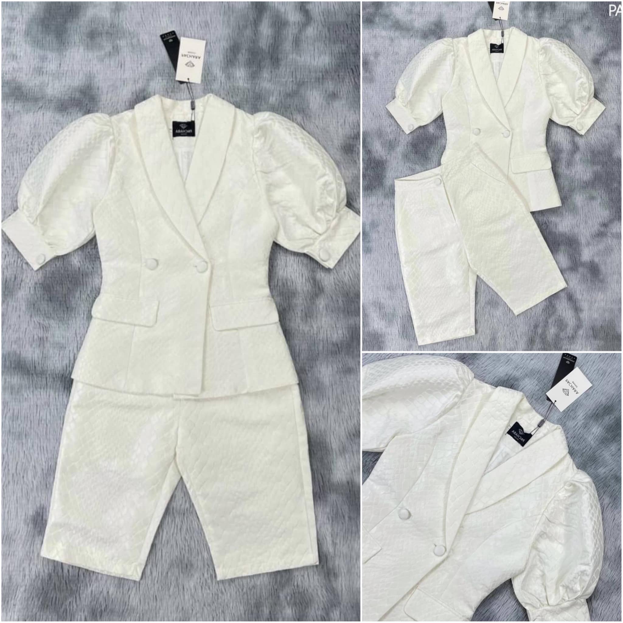 เซ็ต 2 ชิ้น เสื้อคอปกแขนพองจับจีบสีขาว เนื้อผ้าหนาทอลายเกล็ดงูสวยมาก แมทช์คู่กับ กางเกงขาสี่ส่วนเอวสูง มีซับในอัดกาวอย่างดี สินค้าคุณภาพ (พร้อมส่ง)