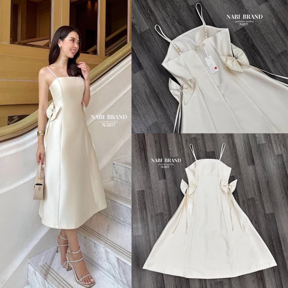 เดรสสายเดี่ยวแขนกุดสีครีม ทรงกระโปรงบาน มาพร้อมเข็มกลัดผีเสื้อติดเพชร : สินค้าคุณภาพ (พร้อมส่ง)