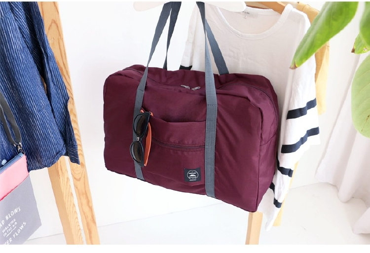 Wind Blows กระเป๋าเดินทางพับเก็บได้ เสียบที่จับกระเป๋าเดินทางได้ มีซิปรูดตอนพับเก็บ สำหรับการเดินทาง ท่องเที่ยว