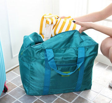 กระเป๋าเดินทางพับเก็บได้ อเนกประสงค์ เพื่อการเดินทาง ท่องเที่ยว เสียบที่จับของกระเป๋าเดินทางได้ (Foldable Travel Duffel Bag Lightweight Waterproof Travel Luggage Bag)