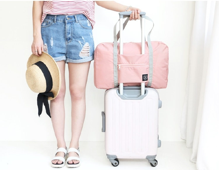 Wind Blows กระเป๋าเดินทางพับเก็บได้ เสียบที่จับกระเป๋าเดินทางได้ มีซิปรูดตอนพับเก็บ สำหรับการเดินทาง ท่องเที่ยว