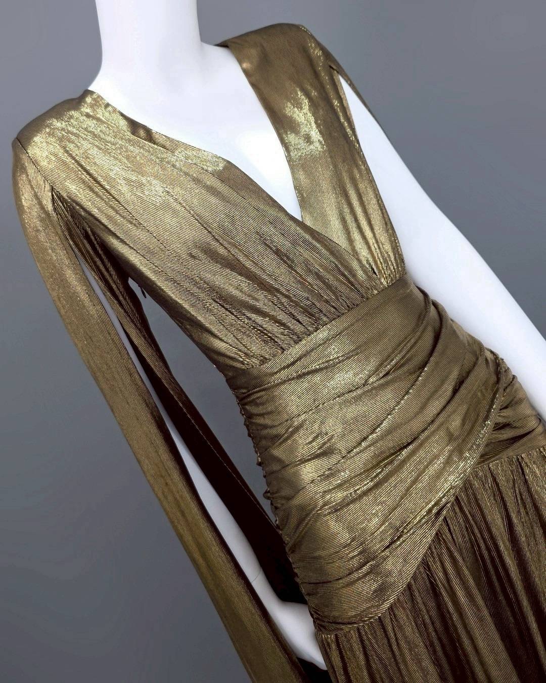 แม็กซี่เดรสเสื้อคอวีป้าย แขนยาวเป็นผ้าคลุมในตัว กระโปรงเข้ารูปตรงสะโพก ผ่าหน้าขา ชายกระโปรงบาน ใส่สบาย : สินค้าคุณภาพ (พร้อมส่ง)