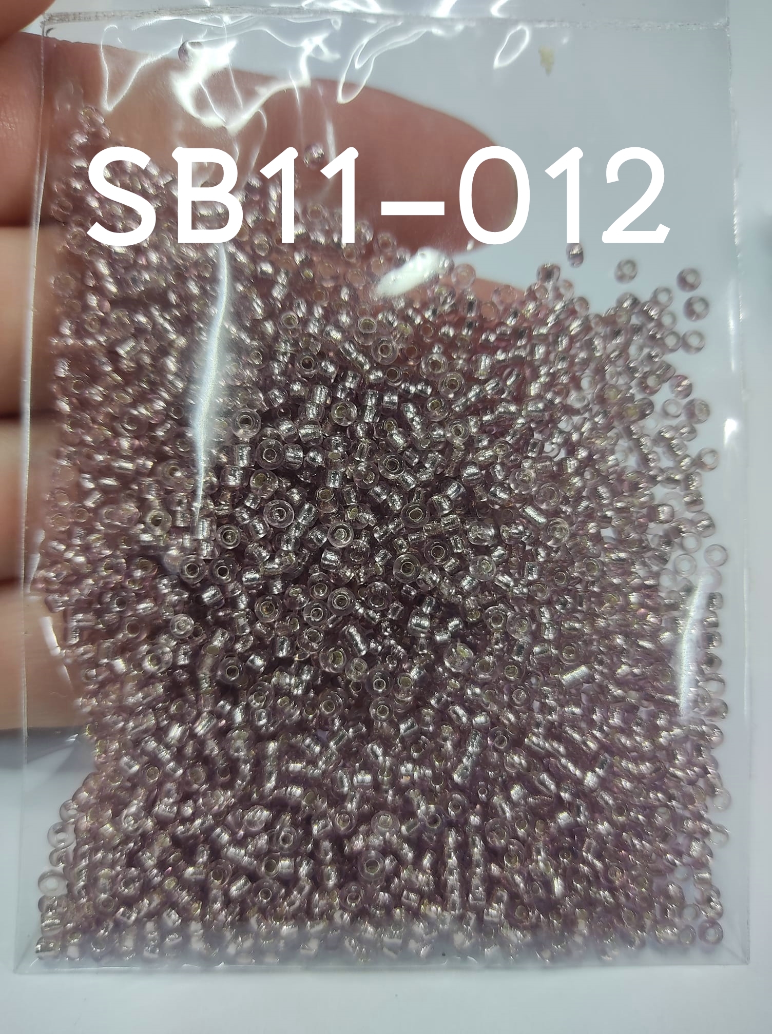 SB11-012 ซีดบีดไซส์เล็ก 2 มิล. สีน้ำตาลแกนเงิน (20 กรัม)