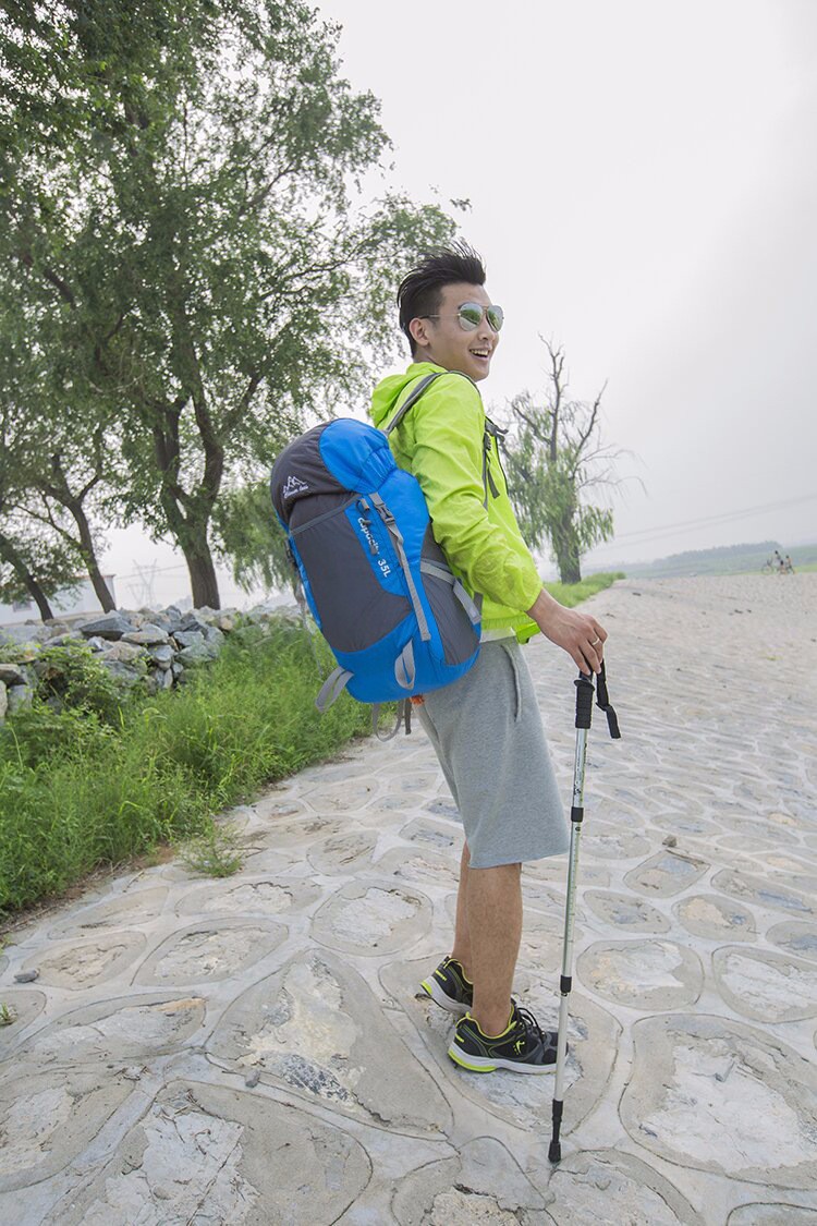 กระเป๋าเป้พับเก็บได้ ขนาด 35 ลิตร น้ำหนักเบา ผลิตจากโพลีเอสเตอร์ กันน้ำ ทนทาน เหมาะสำหรับเดินทาง ท่องเที่ยว