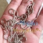 SH-212 Screw Hooks สกรูเกลียวหัวตะขอ ปลายแหลม ความยาวทั้งชิ้น 2 ซม. (ราคาต่อแพค/บรรจุ 10 ชิ้น)